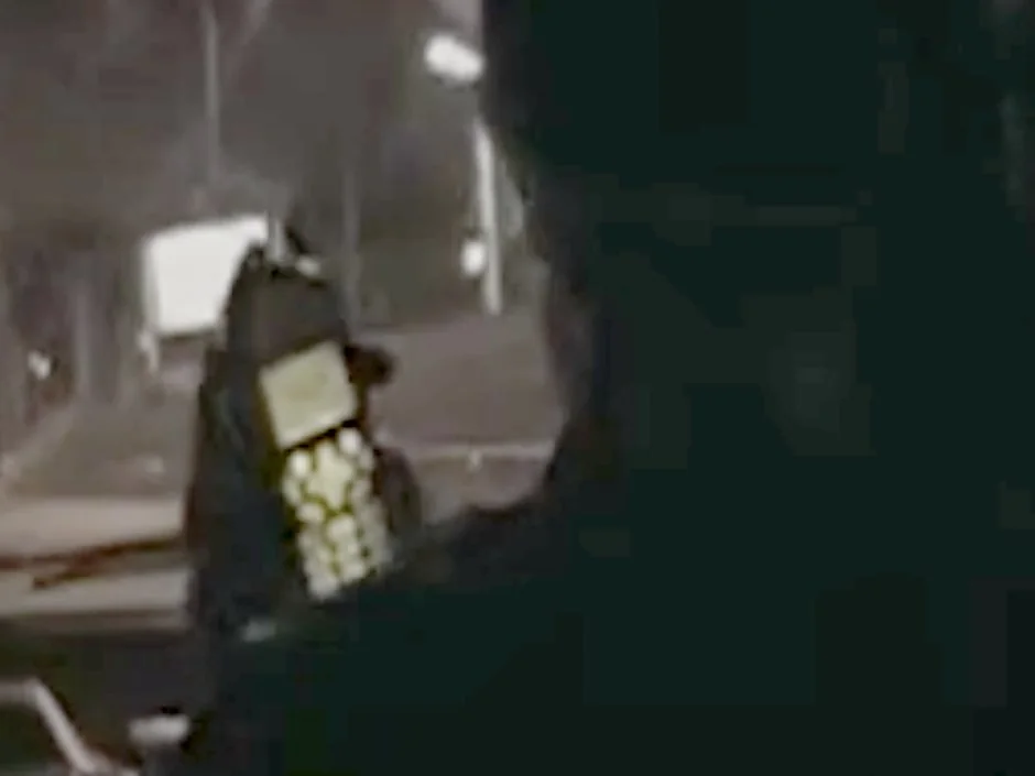 Documentary still of a Nextel handset used during an operation